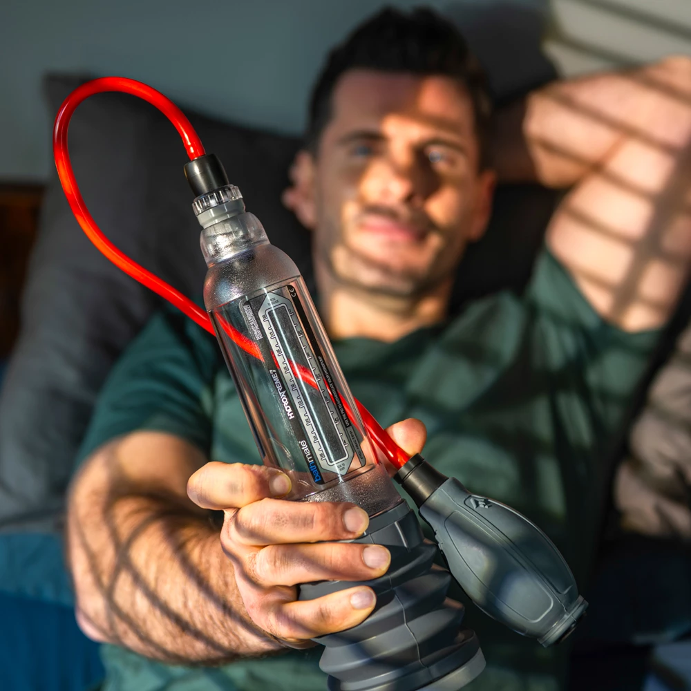 A man holding Bathmate Hydroxtreme pump